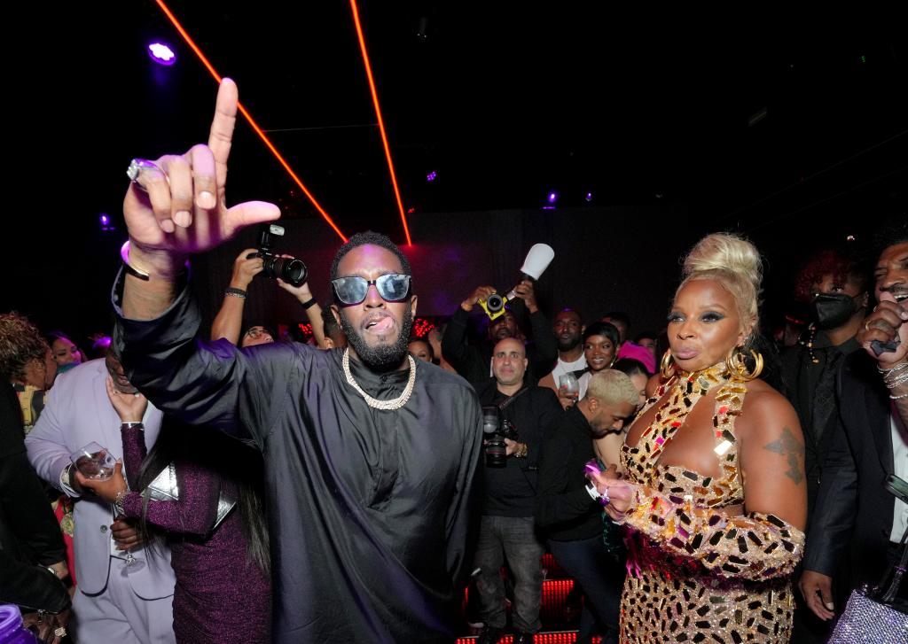 Sean Combs and Mary J. Blige at an after party for the 2022 BET Awards.