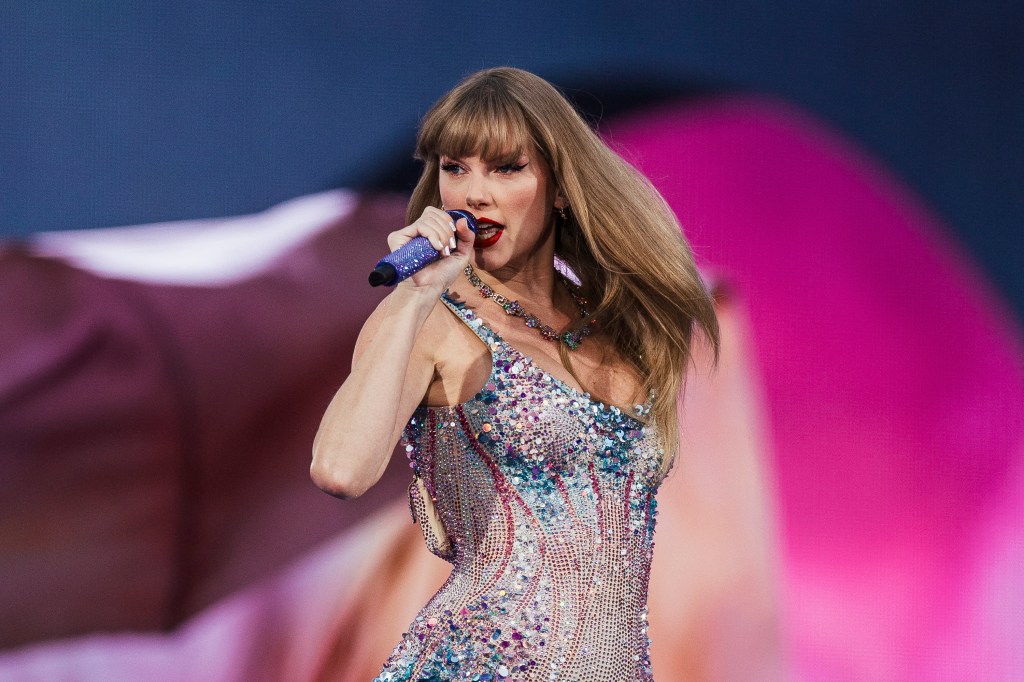 Taylor Swift performs on stage as part of her Eras Tour in Lisbon on May 24, 2024. 