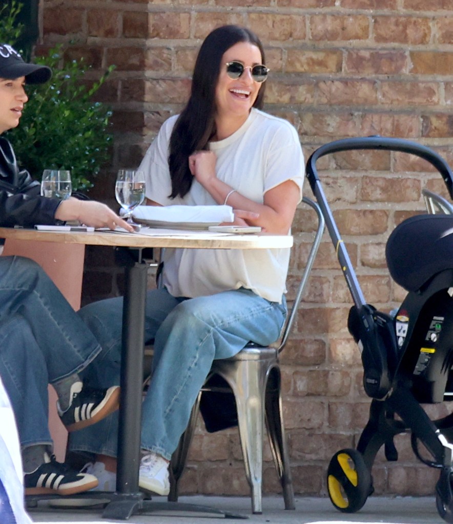 Lea Michele has lunch with her baby girl and a friend while out in NYC.