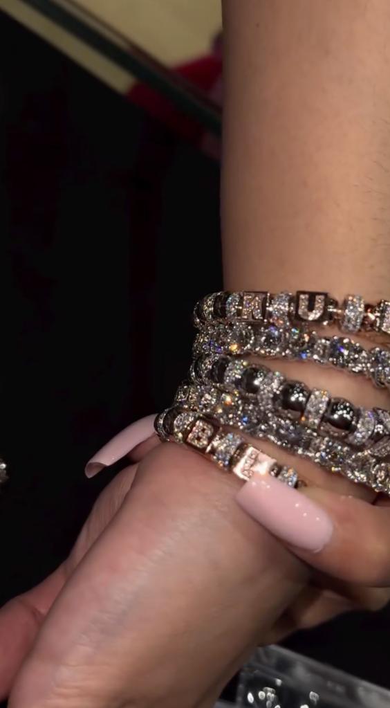 Cardi b shows off her bracelets