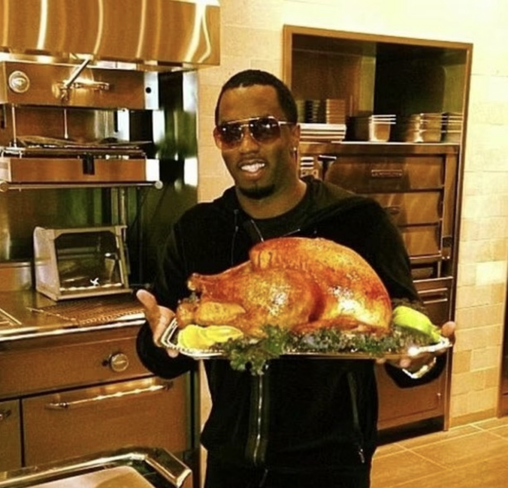 Sean "Diddy" Combs with a turkey