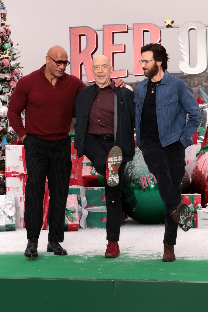 Dwayne Johnson, J. K. Simmons and Chris Evans get silly at the photocall for "Red One" in London.