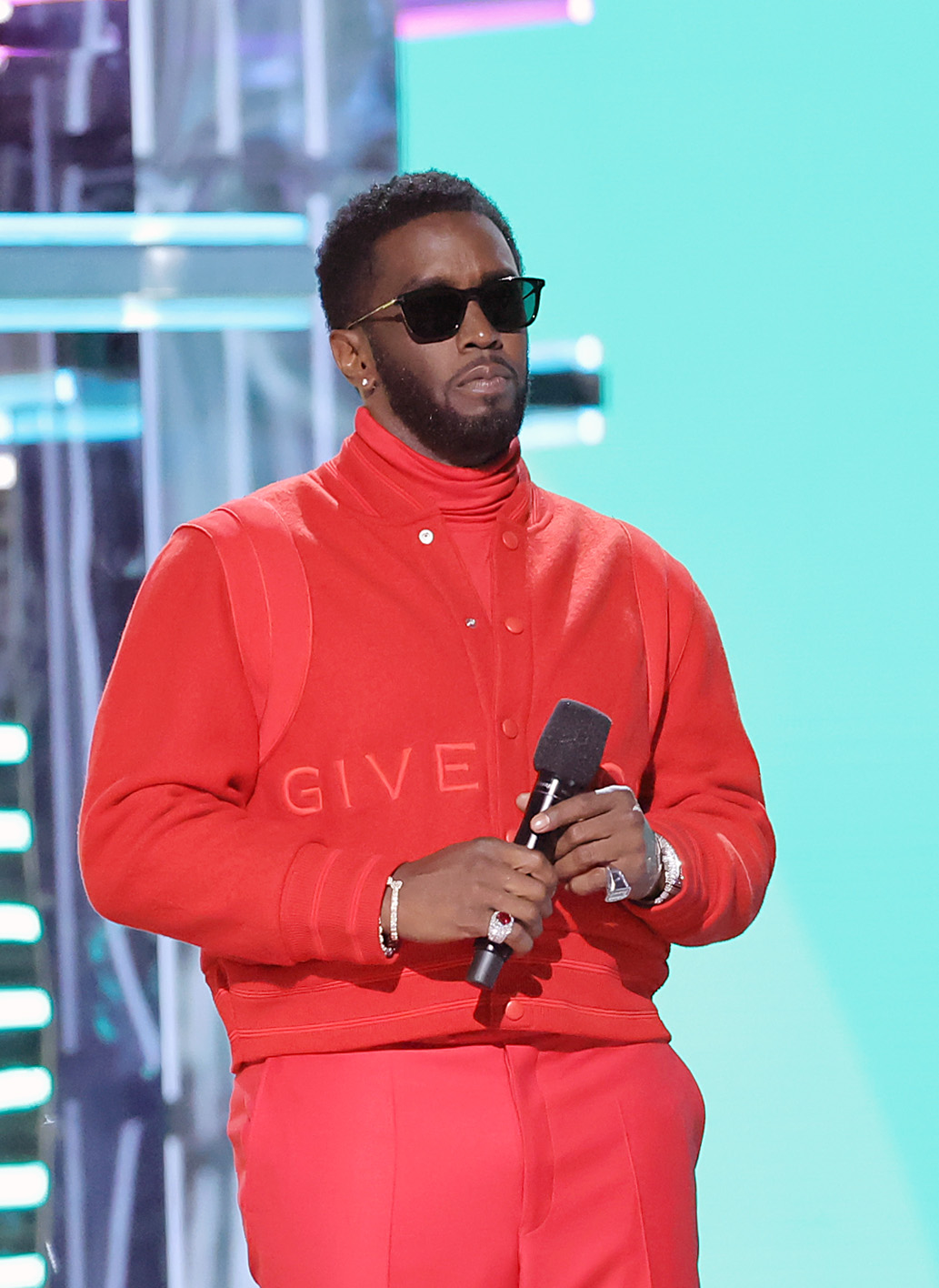 Sean Combs wearing all red.