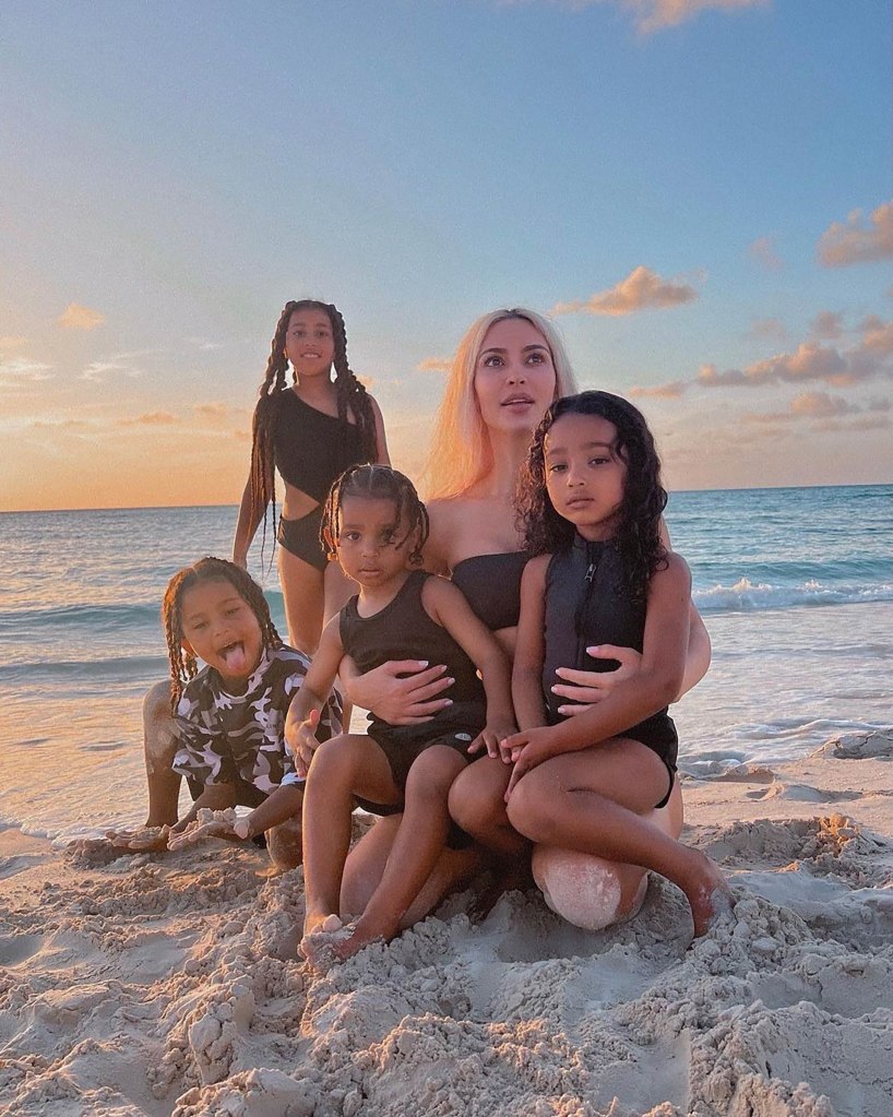 Kim Kardashian on the beach with her four kids. 