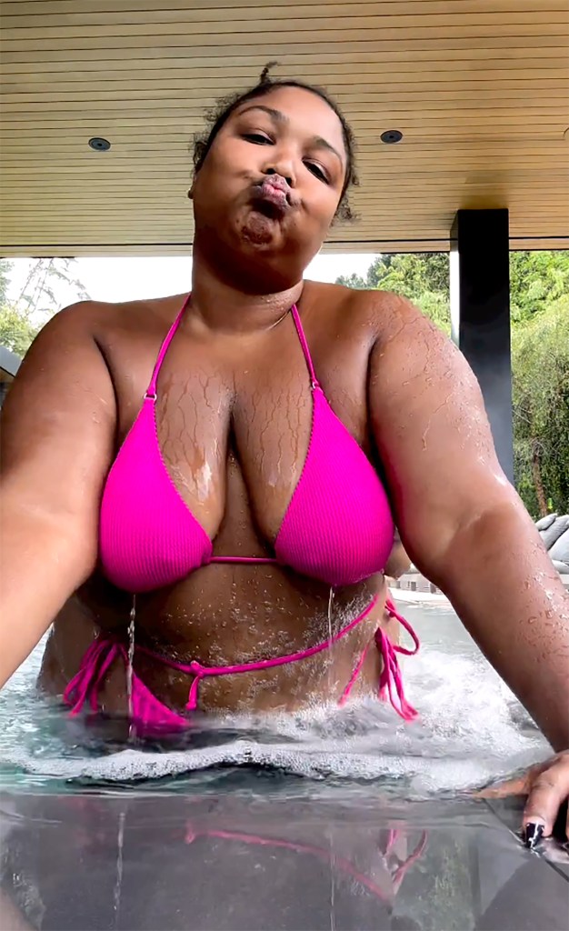 Lizzo poses in a bikini.