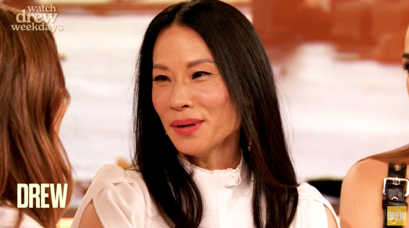 Lucy Liu shared Drew Barrymore once hid in the bushes outside her home following a bad breakup on Monday's episode of "The Drew Barrymore" show.