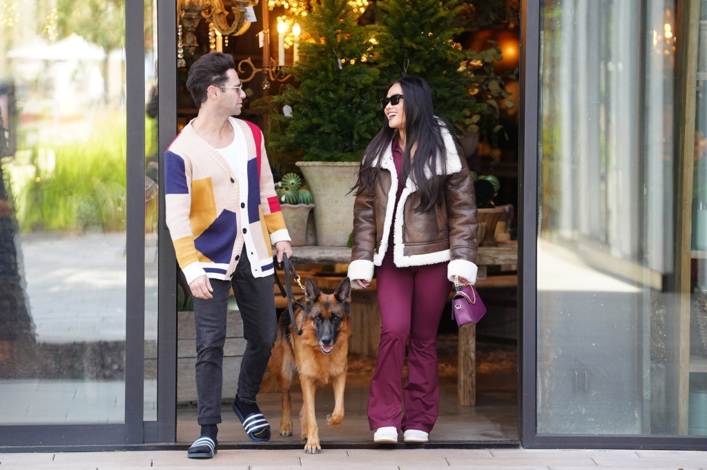 Sasha Farber and Jenn Tran take their dog for a walk in Los Angeles.