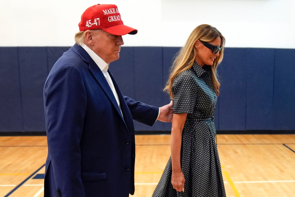 Melania Trump wearing a Dior dress and Donald Trump at the Morton and Barbara Mandel Recreation Center in Palm Beach, Fla., on Nov. 5. 