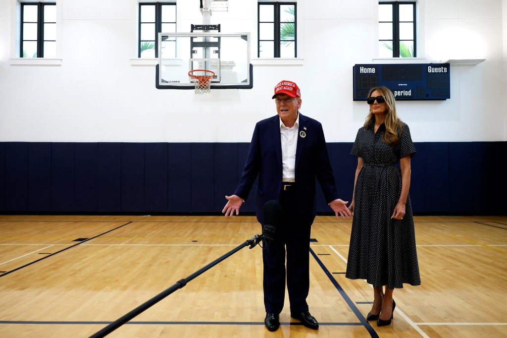 Melania Trump wearing a Dior dress and Donald Trump at the Morton and Barbara Mandel Recreation Center in Palm Beach, Fla., on Nov. 5. 