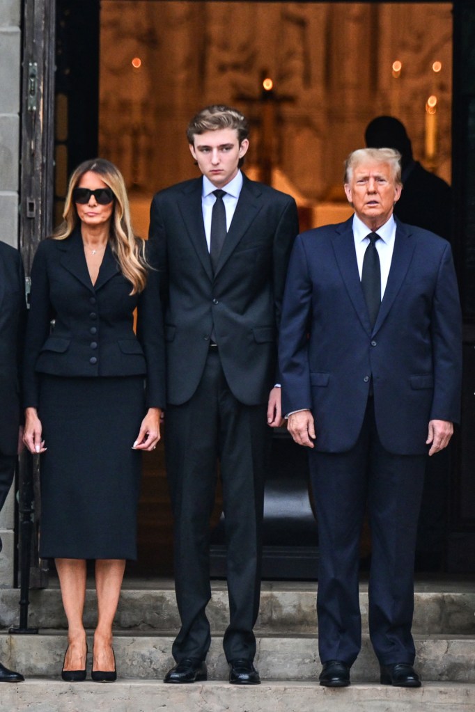 Barron Trump, Donald Trump and Melania Trump in January 2024. 