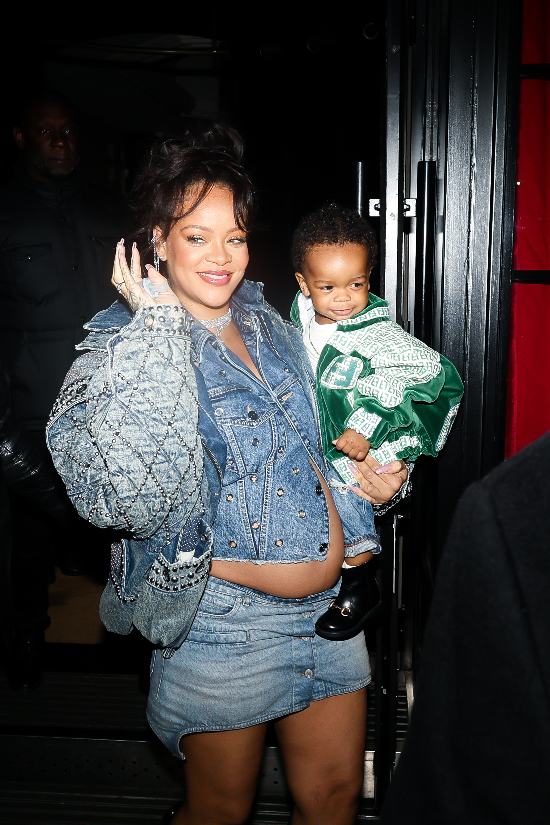 Rihanna holding her first son, RZA.