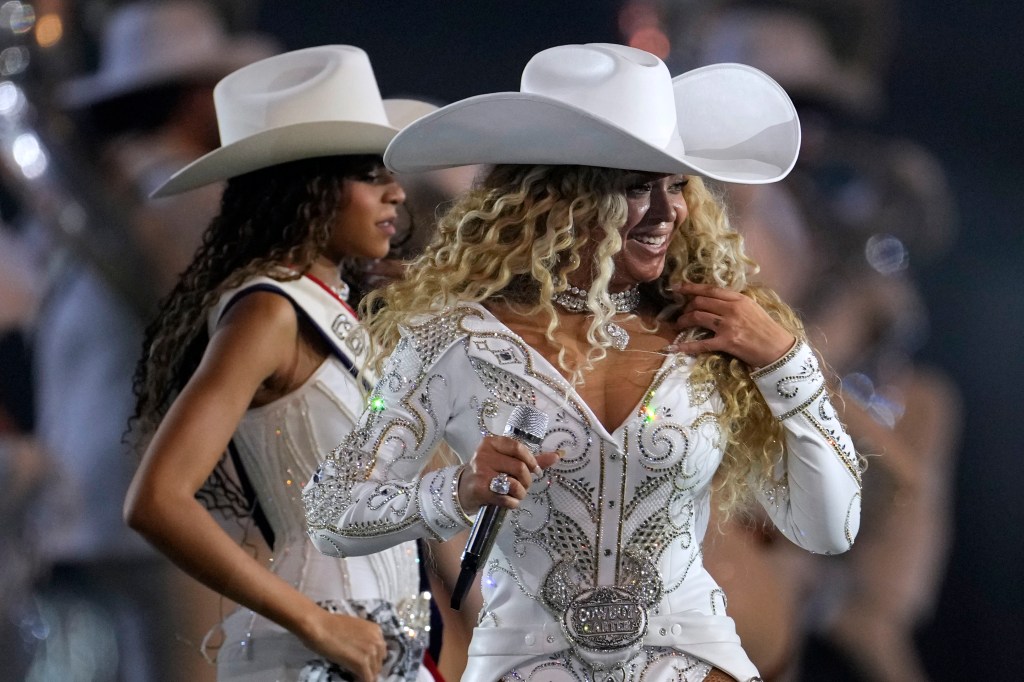 Beyoncé and Blue Ivy performing during the halftime show of the Baltimore Ravens vs. Houston Texans’ Christmas Day game.