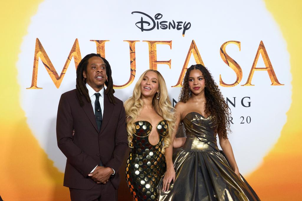 Blue Ivy Carter with parents Beyoncé  and Jay-Z.