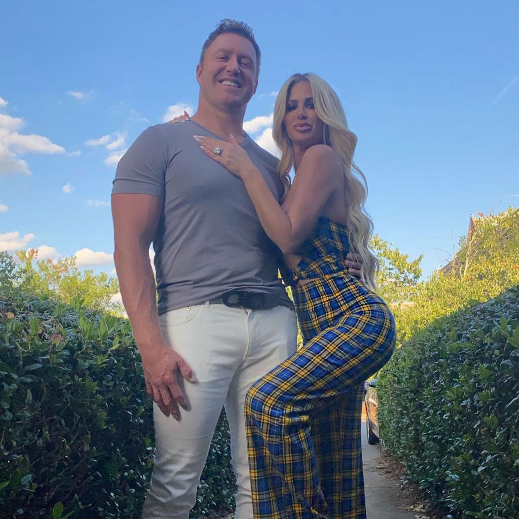 Kim Zolciak and Kroy Biermann posing together.