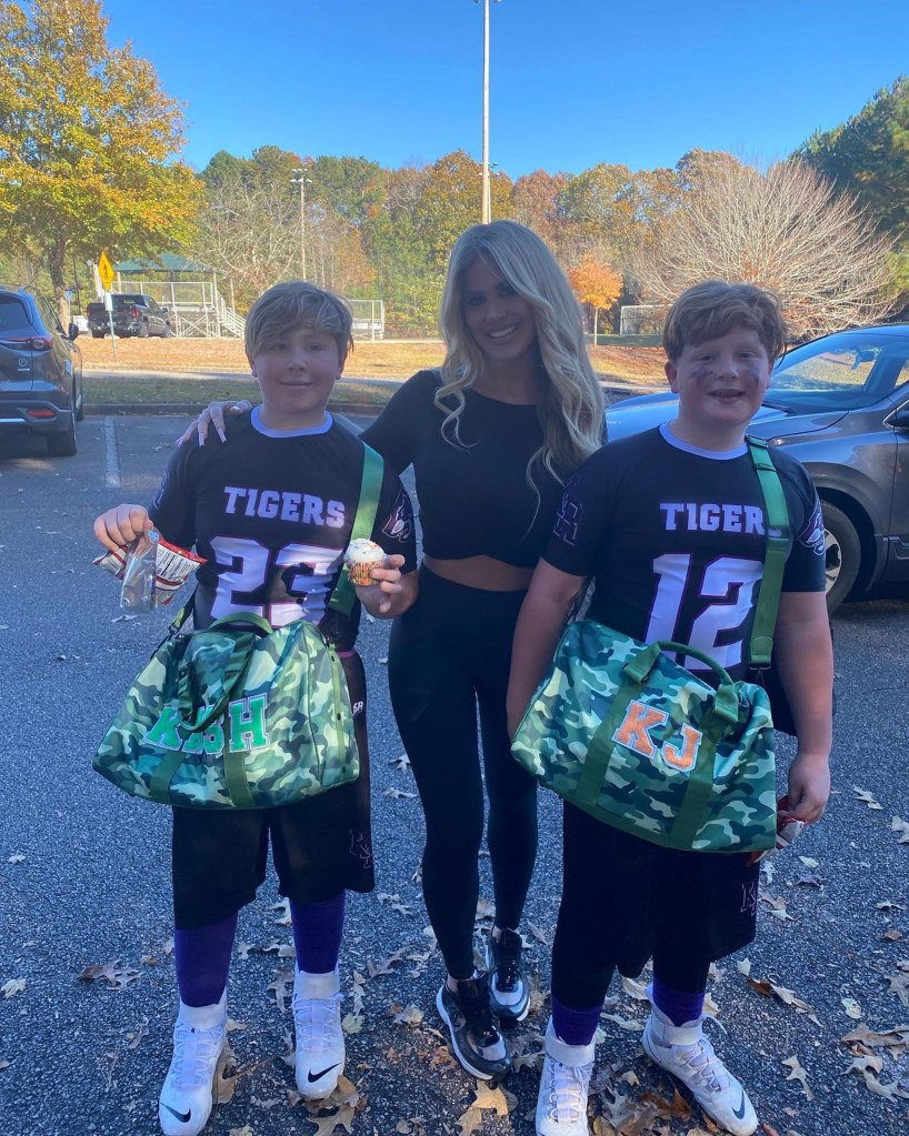 Kim Zolciak and her kids pose together.