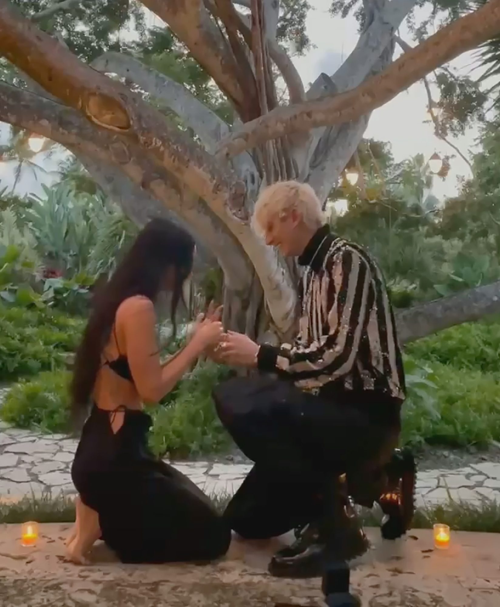 Machine Gun Kelly proposes to Megan Fox.