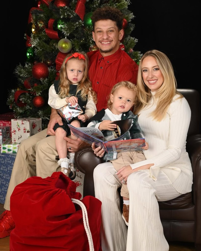 Patrick and Brittany Mahomes with their kids Sterling and Bronze in a Christmas 2024 photo. 