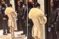 Bianca Censori covers up in furry white coat during outing with husband Kanye West in Tokyo