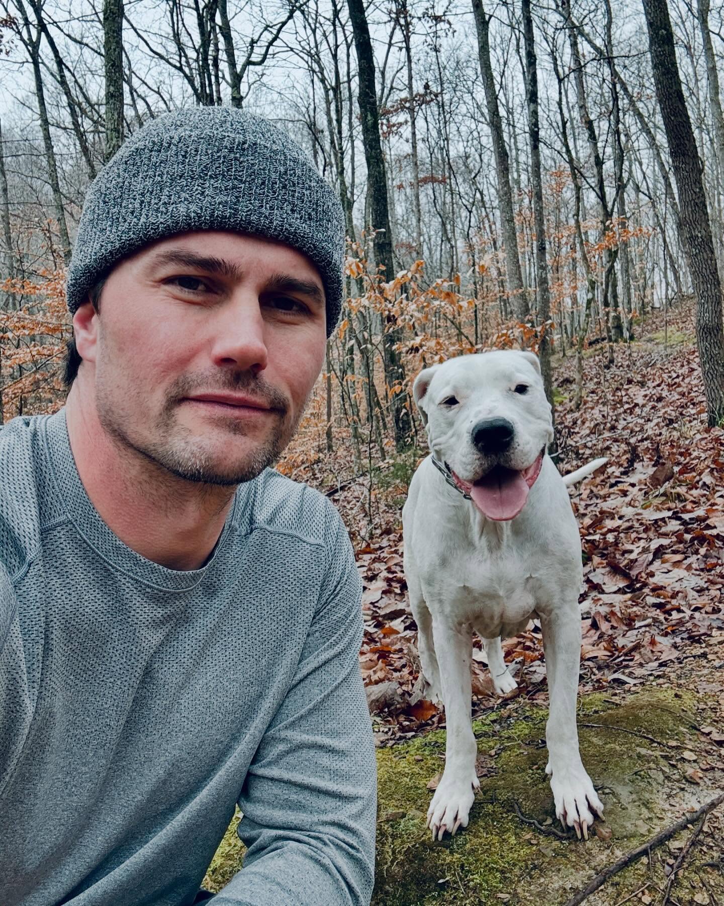 A selfie of Josh Hall with his dog