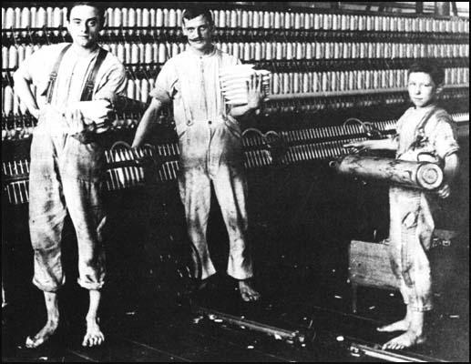 Cotton workers in an Oldham textile mill.