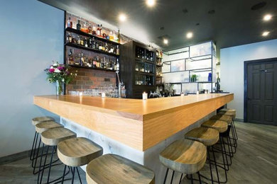 Home bar - contemporary home bar idea in Denver