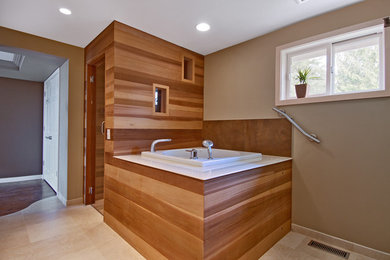 Japanese bathtub - contemporary beige floor japanese bathtub idea in Seattle with beige walls