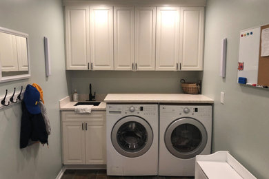 Transitional laundry room photo in Detroit