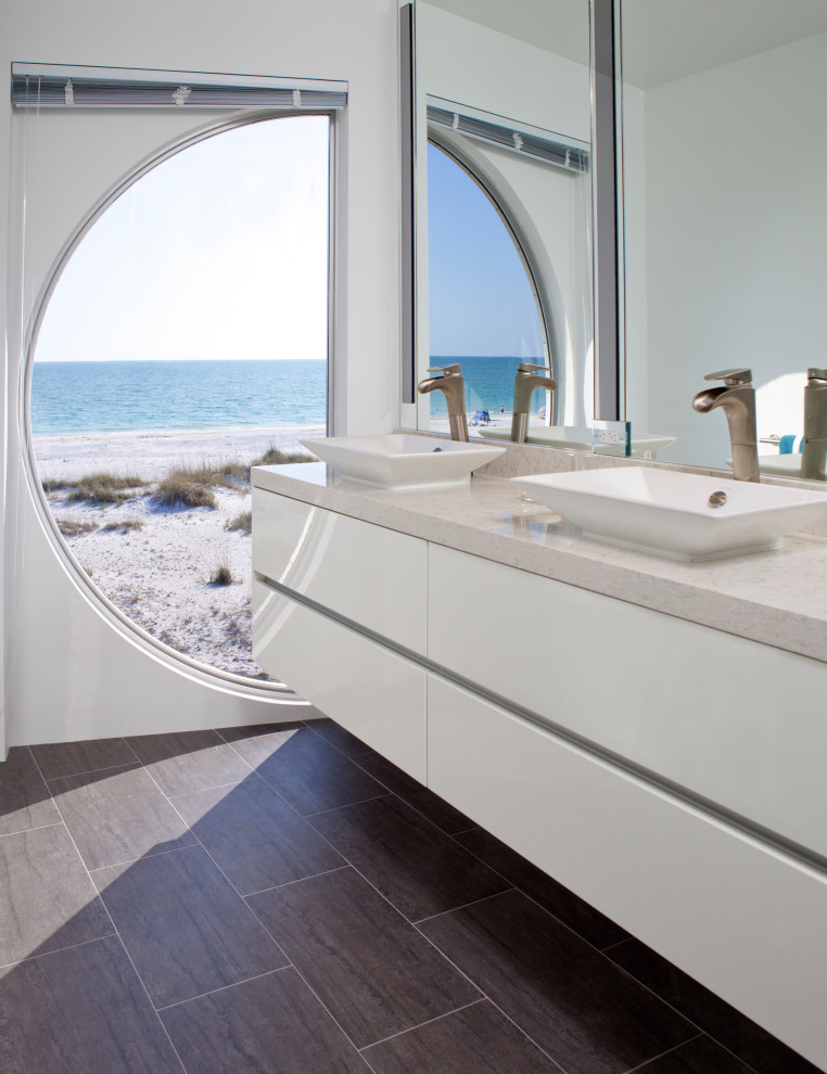 Inspiration for a large contemporary 3/4 brown floor and double-sink bathroom remodel in Tampa with flat-panel cabinets, white cabinets, white walls, a vessel sink, gray countertops and a floating vanity