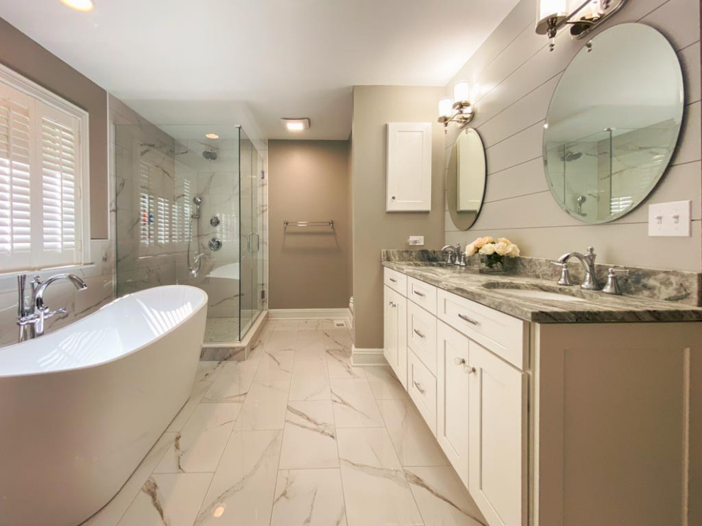 Inspiration for a contemporary master white tile and ceramic tile ceramic tile, white floor, double-sink and shiplap wall bathroom remodel in Cleveland with shaker cabinets, white cabinets, an undermount sink, quartzite countertops, a hinged shower door, multicolored countertops, a niche and a built-in vanity