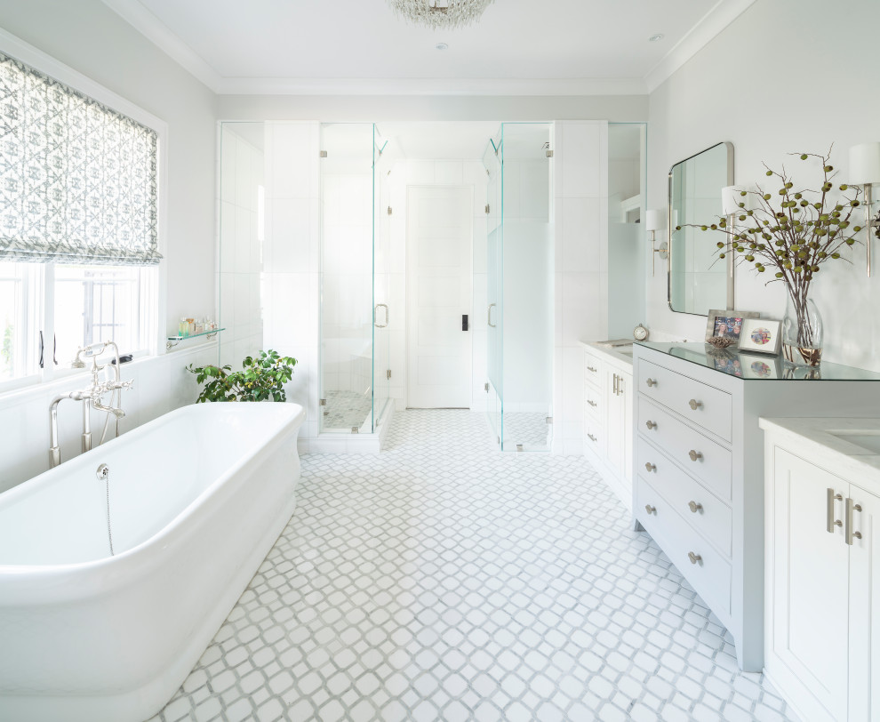 Example of a beach style master multicolored floor bathroom design in Phoenix with shaker cabinets, white cabinets, gray walls, an undermount sink, a hinged shower door and white countertops