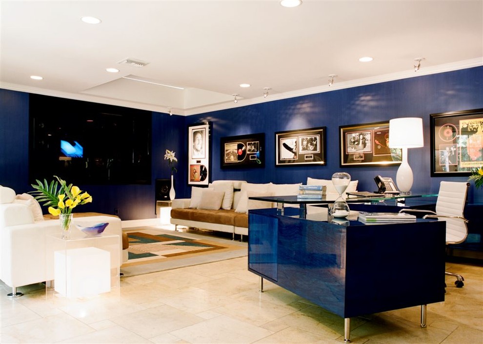 Inspiration for a contemporary home theater remodel in Los Angeles with blue walls