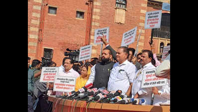 Shiv Sena MLAs hold placards supporting Amit Shah, criticise Congress for ignoring Ambedkar