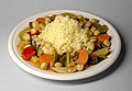 Image 9Couscous (Arabic: كسكس) with vegetables and chickpeas, the national dish of Algeria (from Culture of Algeria)