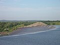 Water flows over the spillway at the Denison Dam, located on the Texas, Oklahoma border.