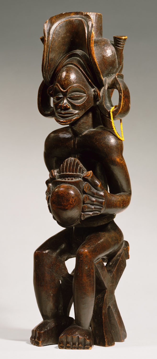 Seated Chief Playing Thumb Piano (Mwanangana)