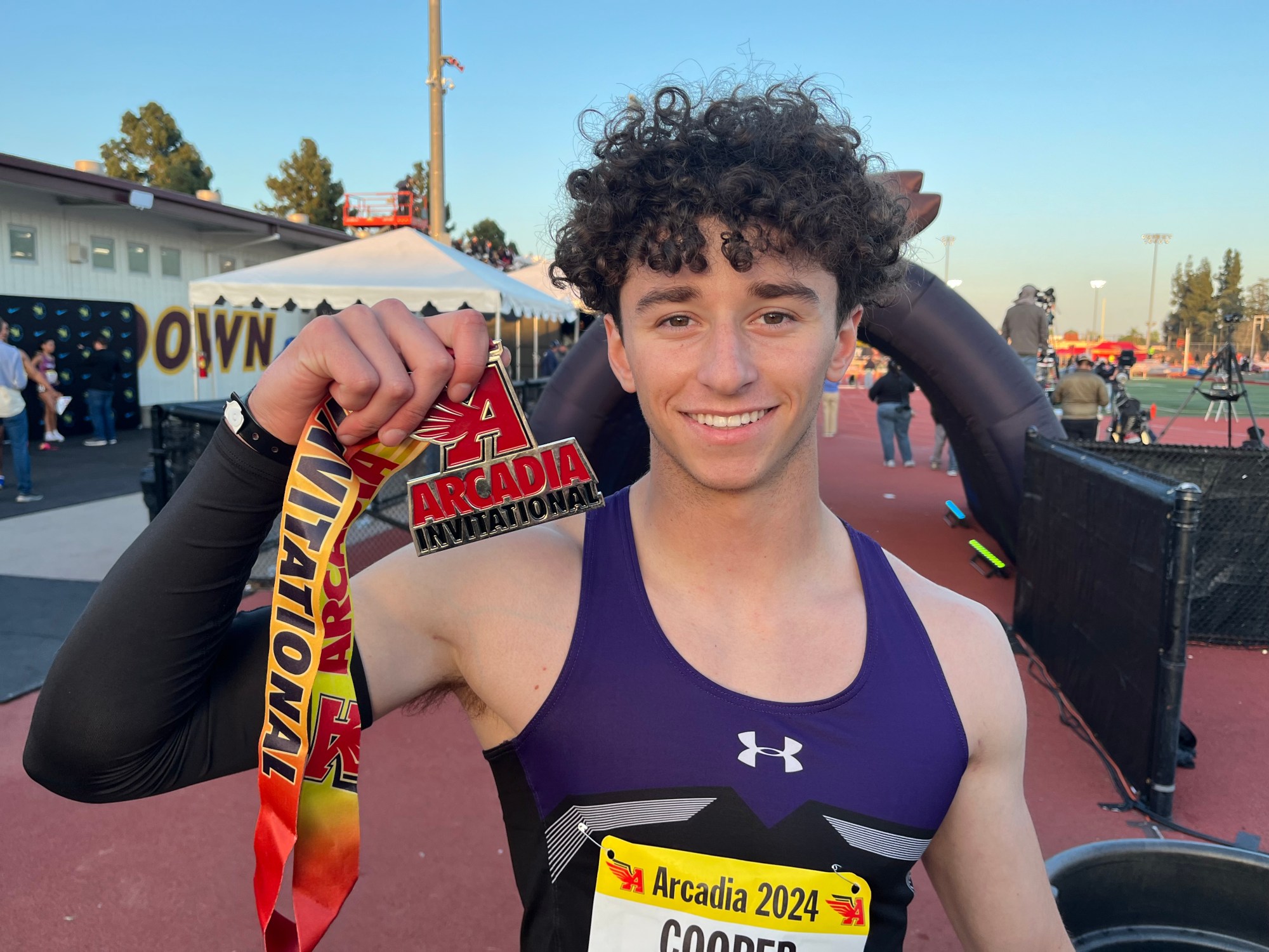Portola senior Rider Cooper shows off his medal for finishing second in the 400 meters at the Arcadia Invitational track and field meet Saturday. (Photo by Steve Fryer, Orange County Register/SCNG)