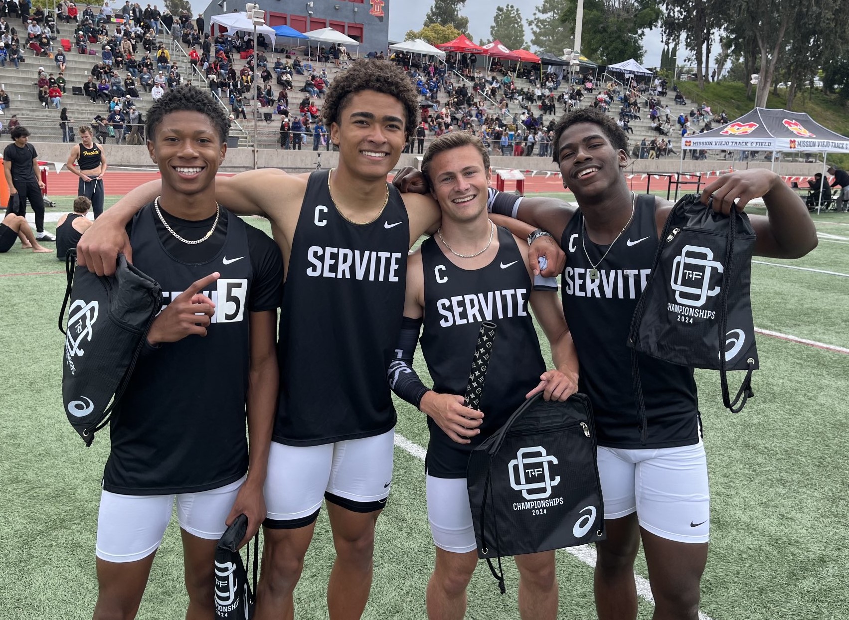 The Servite quartet of, from left, Hudson Haiduc, Robert Gardner, Camren Hughes and Quaid Carr won the 4x100 relay in a meet-record time of 41.66 seconds at the Orange County Championships on Saturday, April 13. (Photo by Steve Fryer, Orange County Register/SCNG)