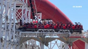 Disneyland employees in safety harnesses evacuated riders after the roller coaster broke down on the track.