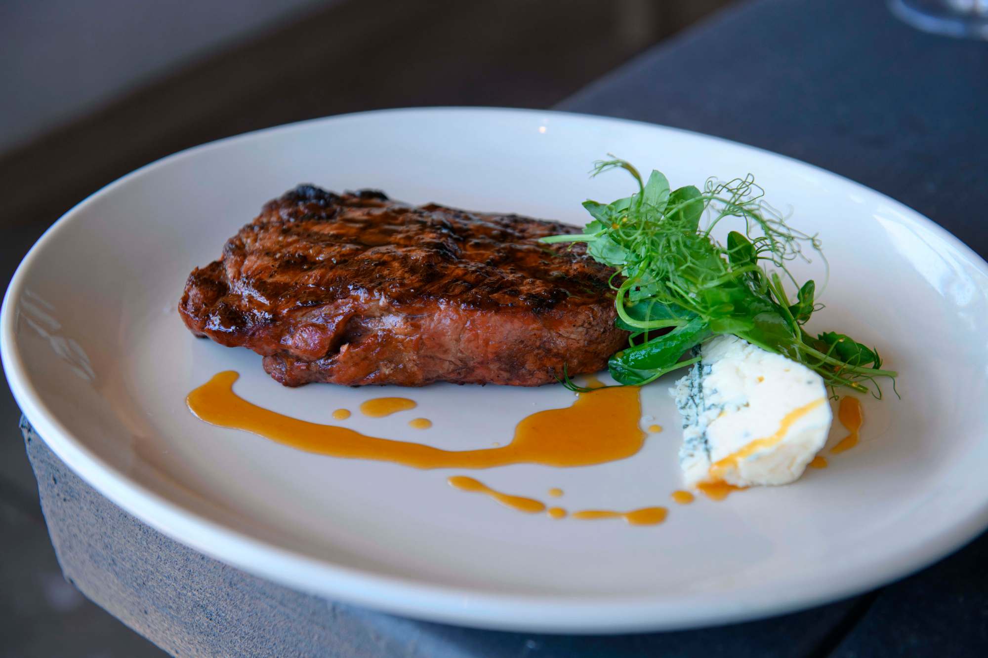 Coffee Crusted NY 14oz steak with bourbon glaze, and blue cheese at Salt Creek Grilled in Dana Point on Friday, June 14, 2024. (Photo by Paul Rodriguez, Contributing Photographer)