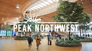 Travelers walk through the newly renovated Portland International Airport.