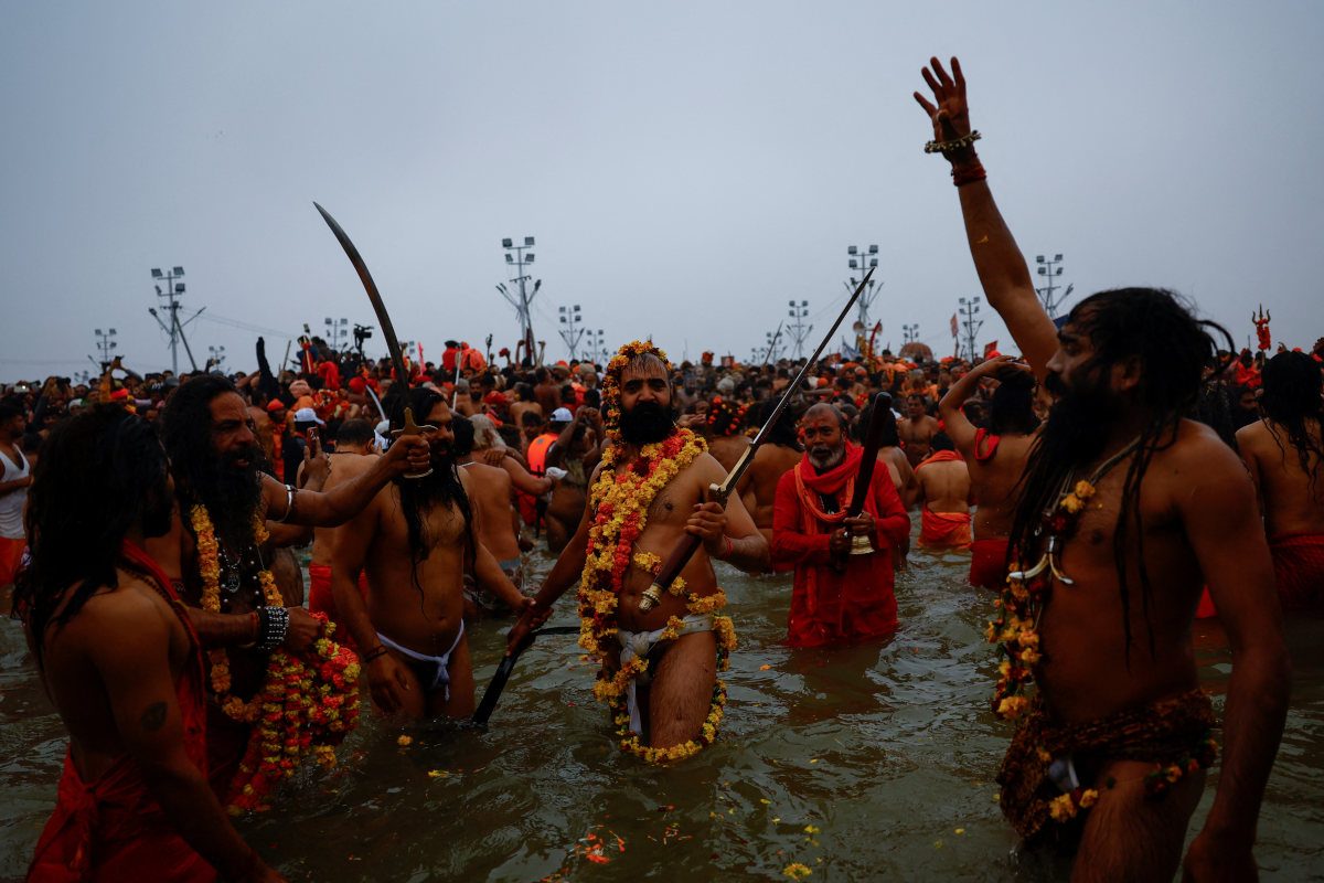 Dreadlocked Indian ascetics take holy dip in Hindu Kumbh festival