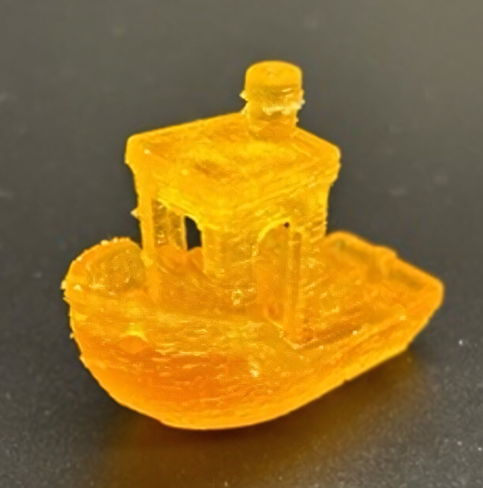 A toy boat printed with the new solvent-free resin through digital light processing, demonstrating the details made possible through the new material. Photo via Duke University.