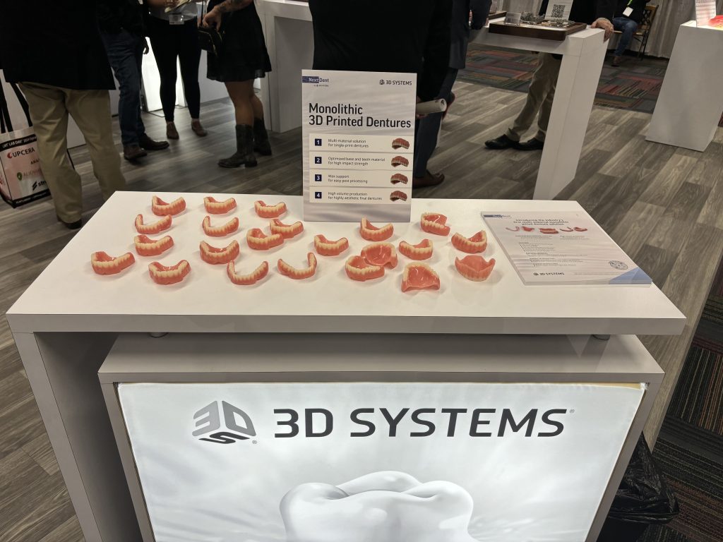 3D Systems showcased its new monolithic denture product line LMT Lab Day 2024. Photo via 3D Systems.