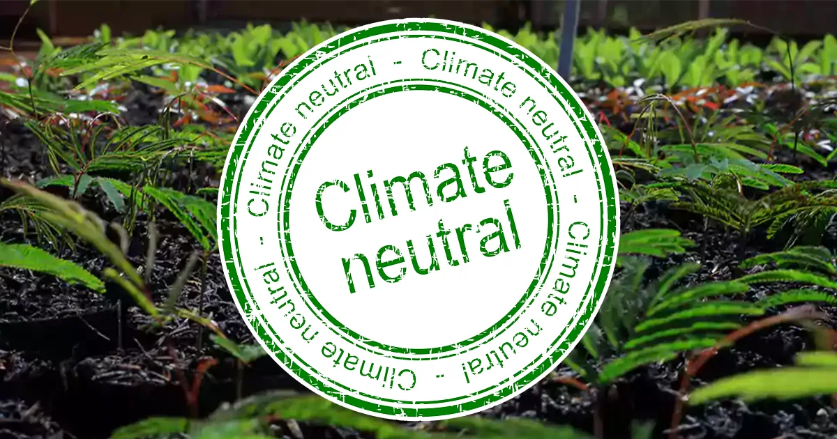 Climate neutral badge placed on image of seddlings being grown.