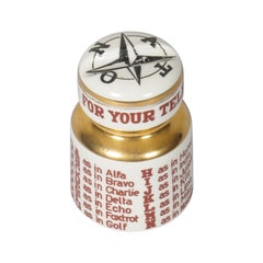 Fornasetti paper weight with NATO phonetic alphabet with pen rest