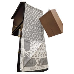 French grey and white Louis Vuitton scarf, with the logo as a graphic motif