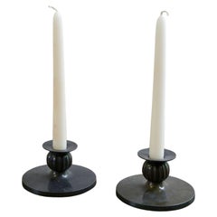 Pair of Just Andersen 'Disco metal' candle holders, 1930s, Denmark