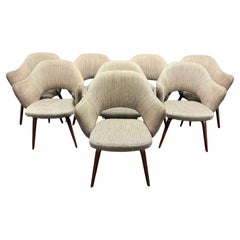 set of 8 saarinen armchairs with wooden legs