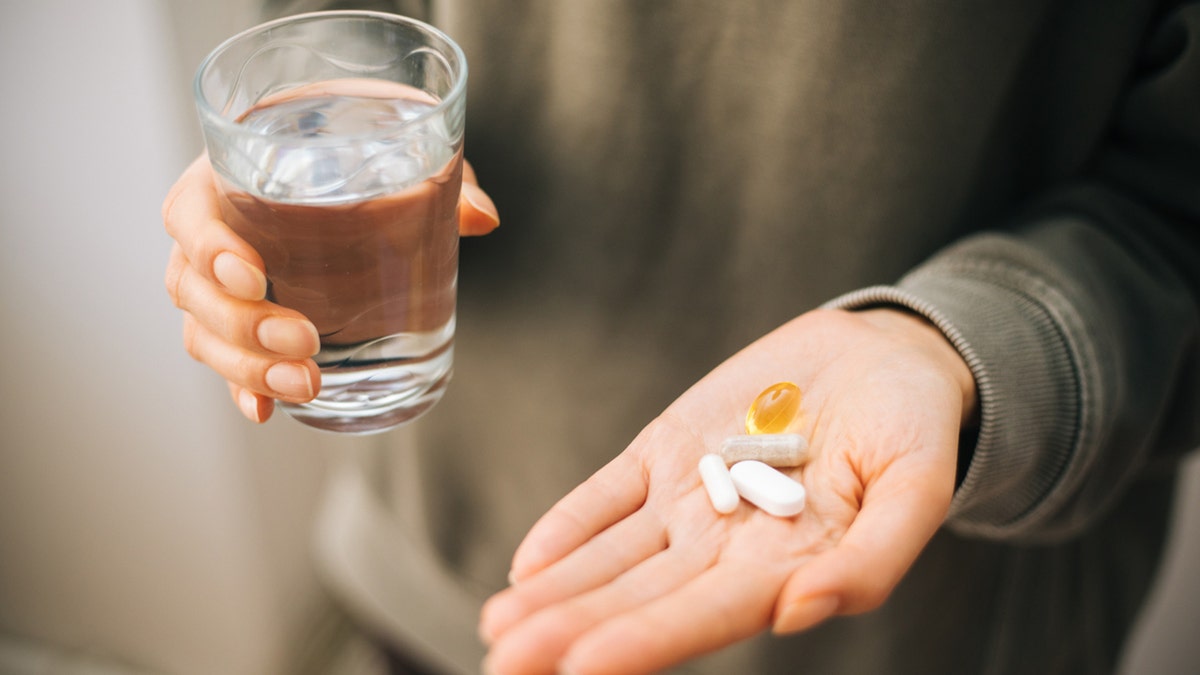 magnesium pills in palm of a hand