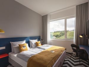 Holiday Inn - the niu, Form Stuttgart Feuerbach